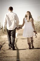 Audra and Josh walking into the sunset