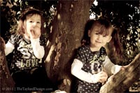 Sammi and Emma in the Citrus Tree